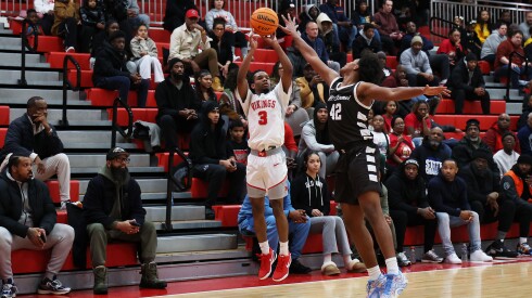Homewood-Flossmoor's Ethan Jackson (3) shoots a three in the first half against Mount Carmel.