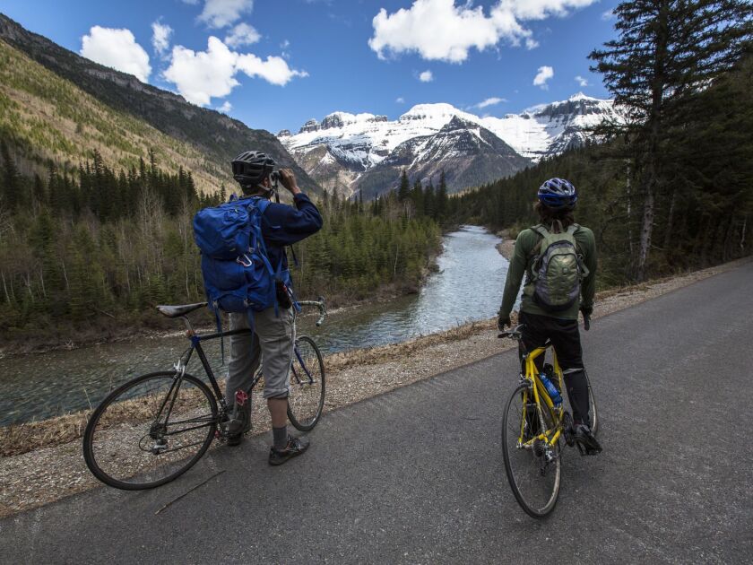 Bikers enjoy the view along the nearly 50-mile-long road that runs from the Glacier Park’s east and west borders. The road is mostly open to bicyclists, except for June 15 through Labor Day, when a few sections of the road are closed to bicycles between 1