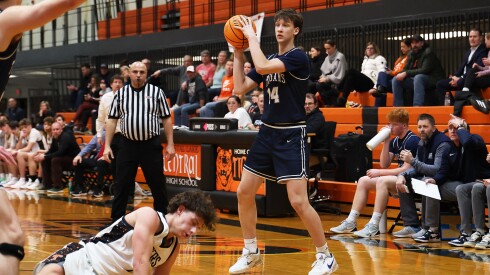 Cary-Grove's Evan Bauer (14) looks to pass against Crystal Lake Central.