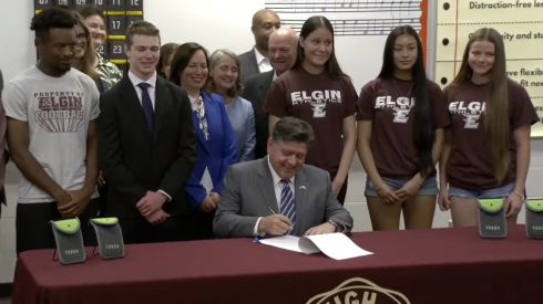 Gov. JB Pritzker signs legislation Tuesday requiring school districts to ban cellphones during class time.