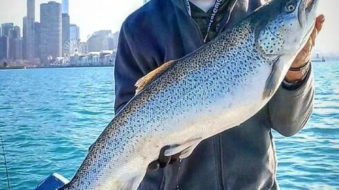 Tony Hammond with a good brown trout on the Chicago lakefront. Provided photo