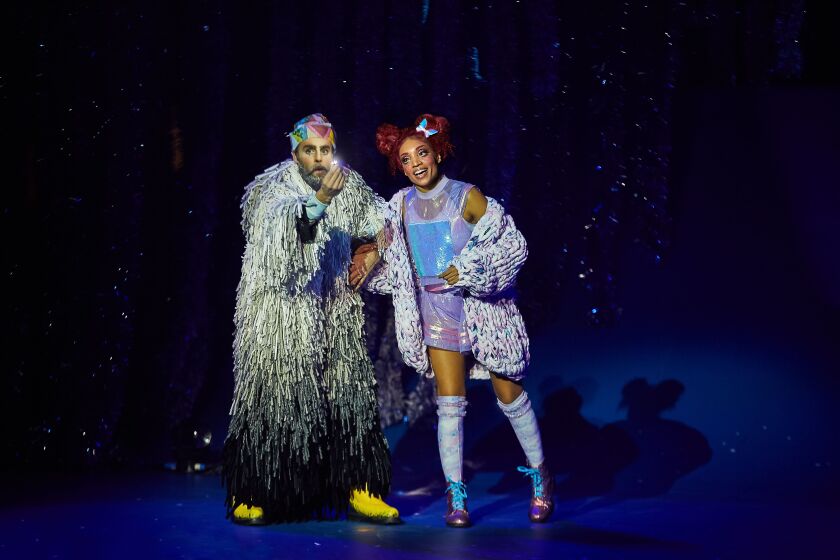 Francis Gadbois as Jolly and Michelle Clark as Isabella in Cirque du Soleil’s holiday show, “‘Twas the Night Before.”