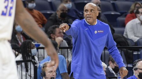 DePaul coach Tony Stubblefield gestures during the first half of an NCAA college basketball game against the Rutgers