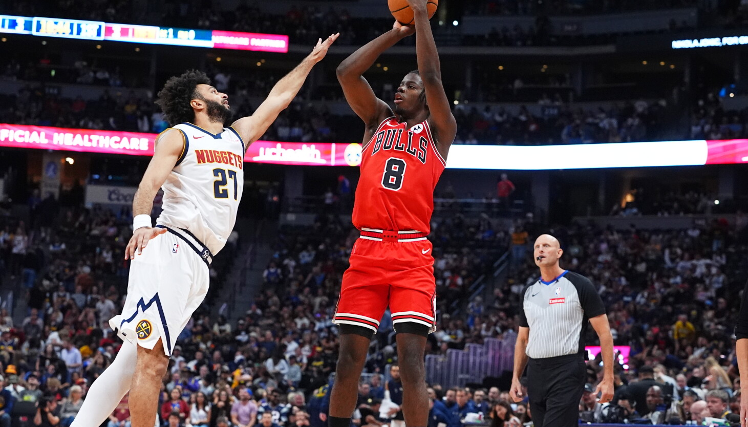 Center of attention for shrinking Bulls as they fall in Denver 133-128