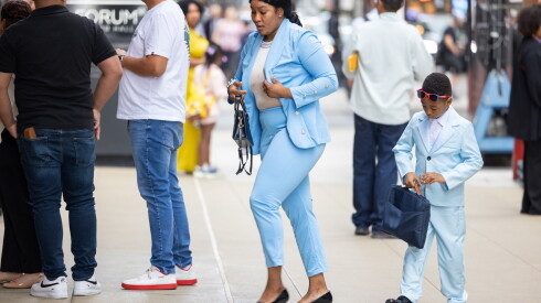 A mother and son walk into Chicago's immigration court building on Wednesday.