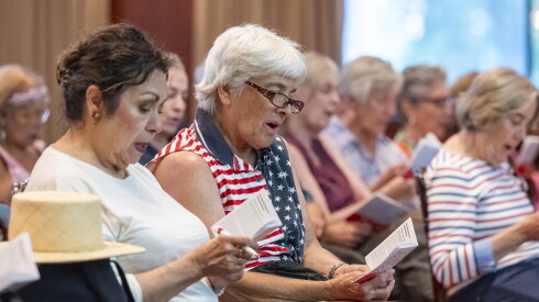 Dozens of people gather inside Ruggles Hall at the Newberry Library for a state and nationwide reading of The Declaration of Independence on the 250th Anniversary of the first public reading of the Declaration, Wednesday, July 8, 2026.