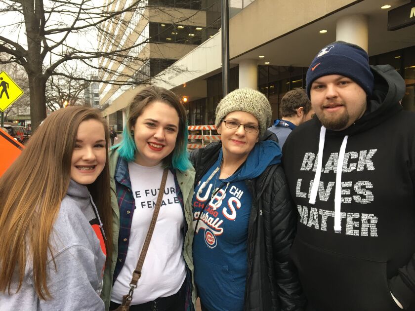 Sheena Garland (in Cubs shirt) of Mahomet, Ill., was at the march with her children (from left): Whitney Eisfelder, 16; Aubree Henderson, 25; and Austin Henderson, 23. | Suzanne McBride/Sun-Times