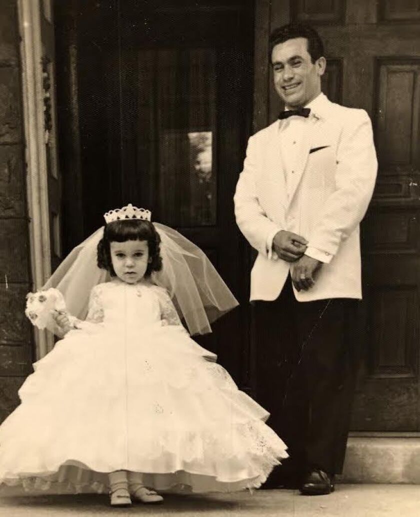 Anthony Gattuso and his daughter Nancy at a family wedding. She’s wearing a replica of the dress worn by the bride, her aunt. | Provided photo