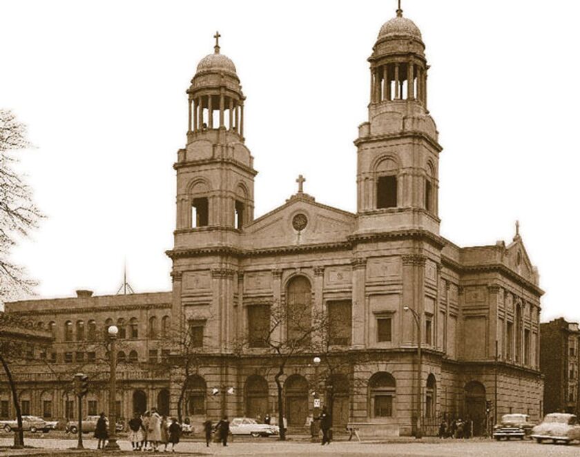 Corpus Christi Church around the mid-20th century. The twin bell towers were removed in 2004.