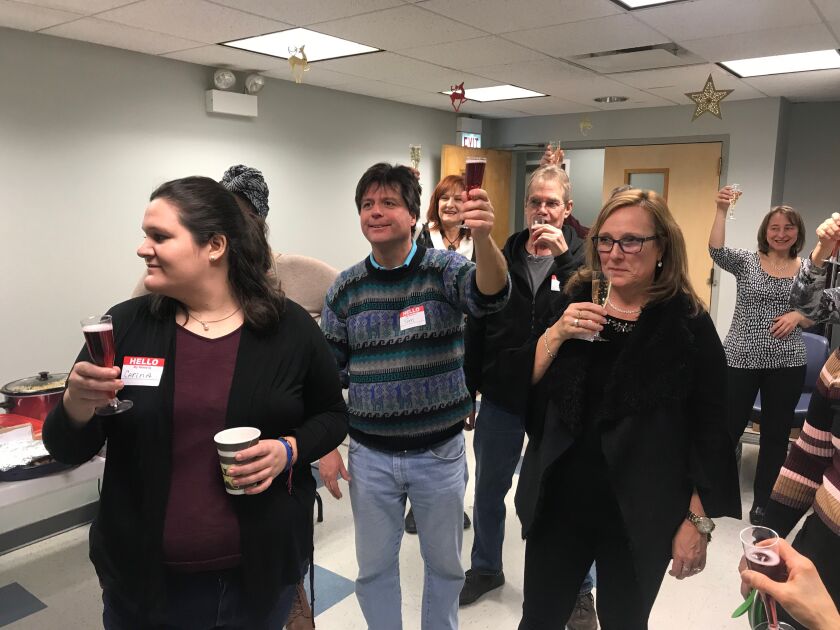 ChicagoVeg members toasted to their new ranking as the third friendliest community for vegans and vegetarians worldwide by Meetup at a vegan potluck in Uptown on Dec. 30. | Taylor Hartz for the Sun-Times.