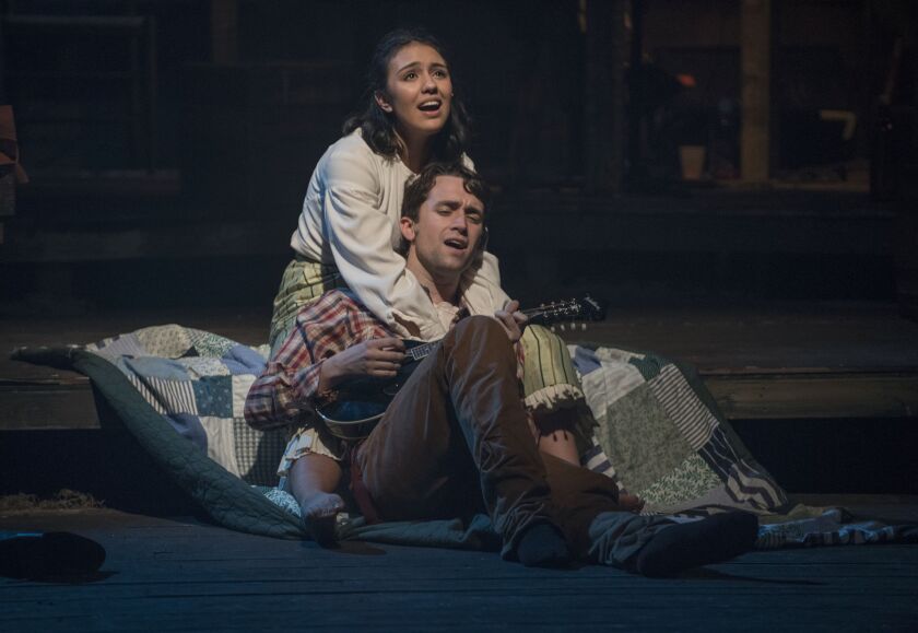 The two lovers, Rose Anna McCoy (Haley Bolithon) and Johnse Hatfield (Kyle Whalen), wake up the morning after their wedding day in a scene from “Hatfield & McCoy.” | MICHAEL BROSILOW