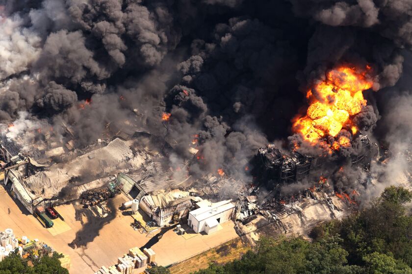 Firefighters from Northern Illinois and Southern Wisconsin battle an industrial fire at Chemtool Inc. on June 14, 2021 in Rockton, Illinois.