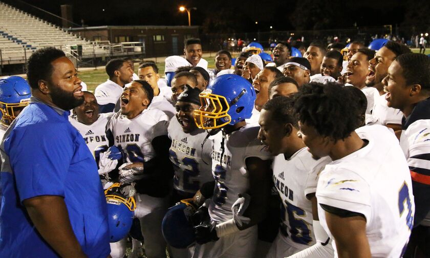 Simeon’s coach Dante Culbreath talks to his players. |Allen Cunningham/For the Sun-Times.