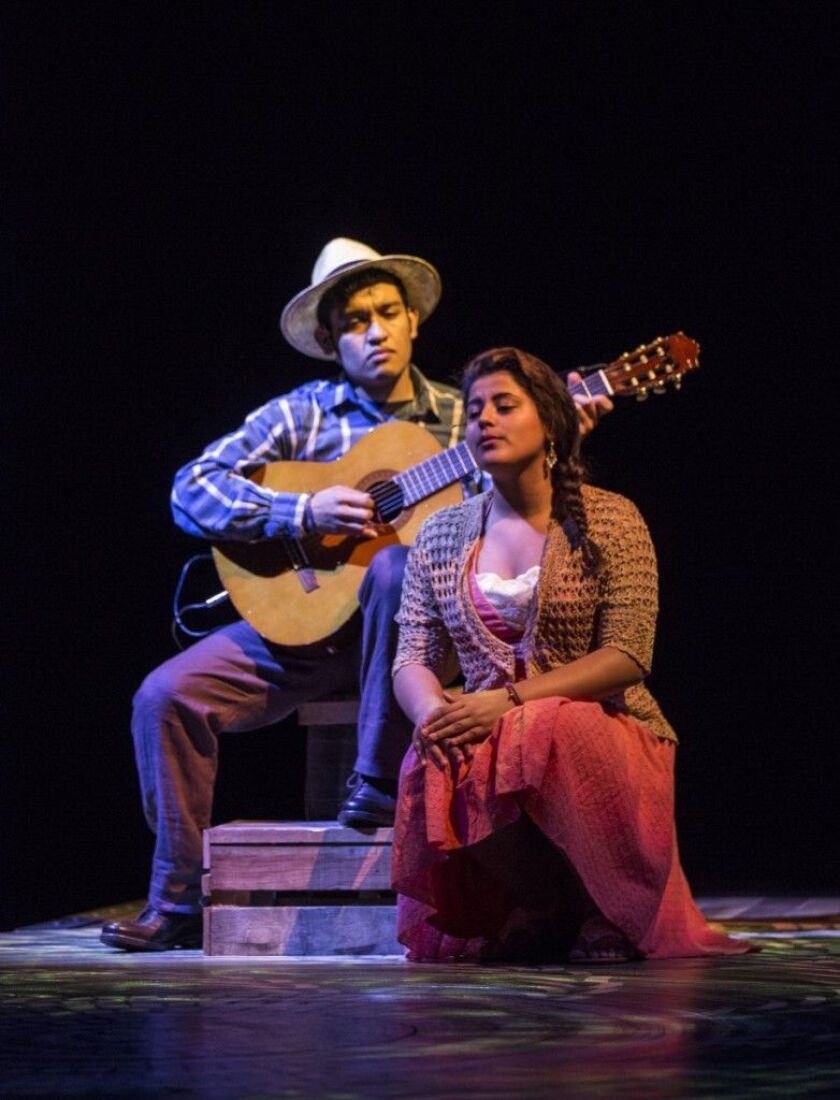 Hector Velazquez and Paola Rico play a Puerto Rican sugar cane laborer and his wife in Albany Park Theater Project’s “Feast.” (Photo: Liz Lauren)