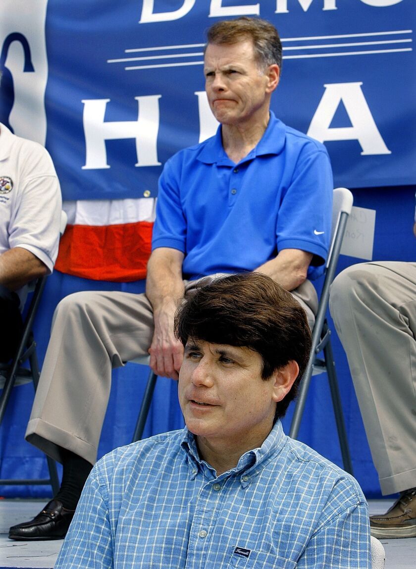 House Mike Madigan, D-Chicago, top, and then Gov. Rod Blagojevich, bottom, attend the “Governor’s Day” rally at the Illinois State Fair in Springfield in 2007.