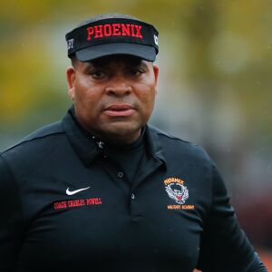 Phoenix coach Charles Powell looks on during warmups before the game against Marine.