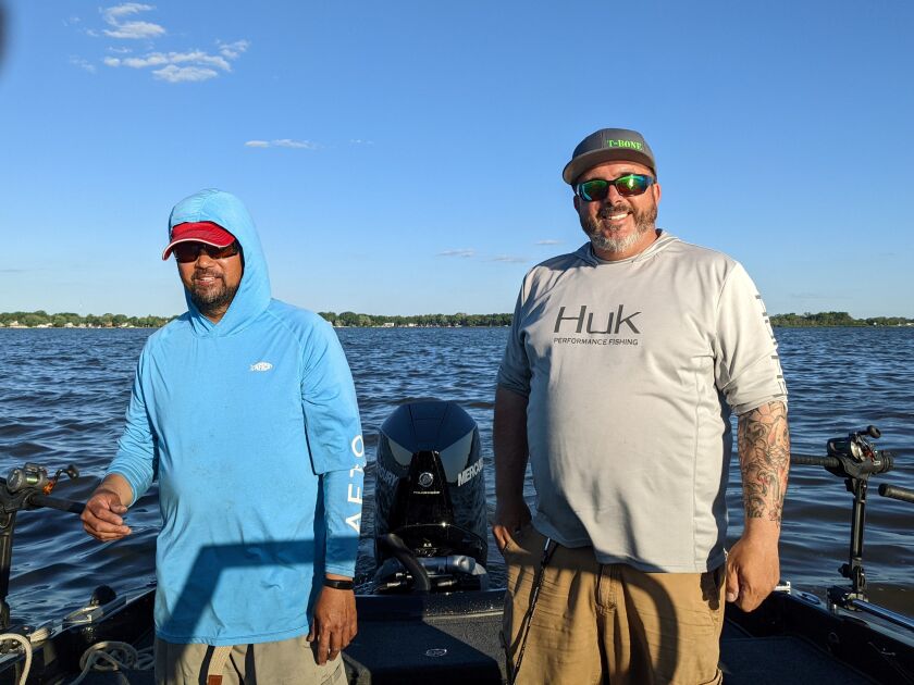 Capt. Gerry Urbanozo (left) and Capt. Anthony Zimmer during a trolling sweep Friday on the Fox Chain O’Lakes.