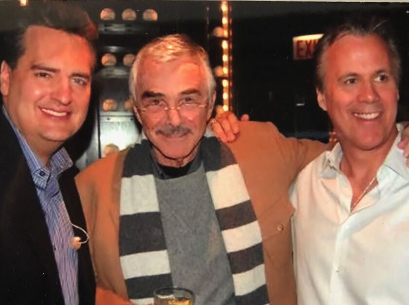 Burt Reynolds (center) with Roe Conn and Richard Roeper during a radio broadcast at Harry Caray’s Navy Pier in 2011. | PROVIDED PHOTO