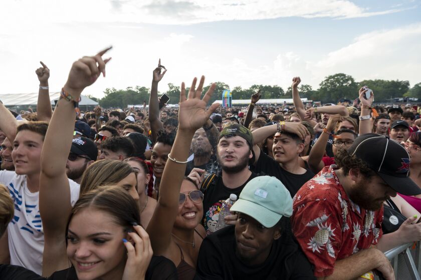 Fans cheer and dance as Coi Leray performs Saturday afternoon on day two of the Summer Smash Festival in Douglass Park.