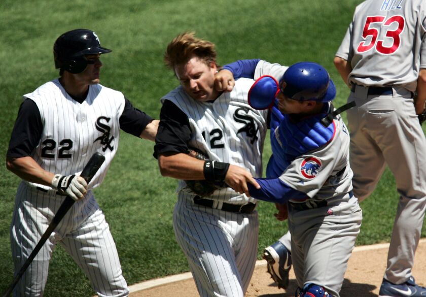 Michael Barrett punches A.J. Pierzynski.