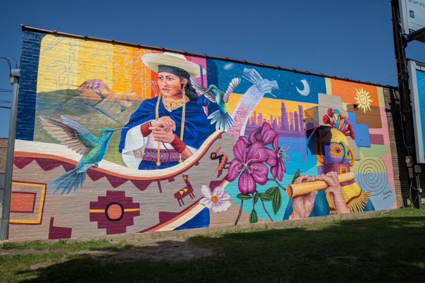 A mural by Fernando Lechón honors indigenous Ecuadorian culture.