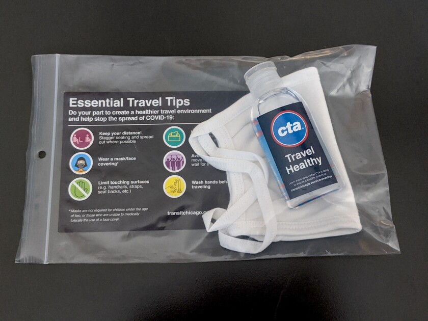 The city has already dispensed thousands of kits with reusable cloth masks and hand sanitizer.