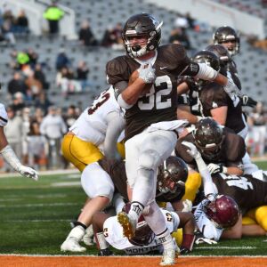 Joliet Catholic’s Nick Iannantone (32) steps into the end zone. Worsom Robinson/For the Sun-Times.