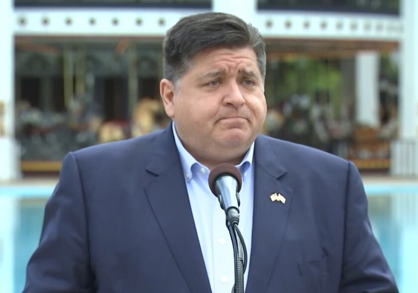 Gov. J.B. Pritzker speaks at Six Flags Great America in Gurnee on Thursday.