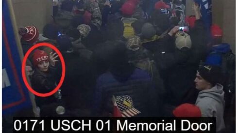 Federal authorities say this depicts Leticia Vilhena Ferreira of Indian Head Park inside the U.S. Capitol on Jan. 6, 2021.