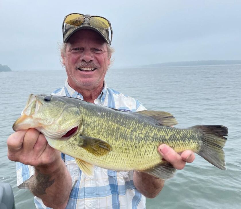 Duane Langenwalter with a good largemouth bass from Big Green. Provided by Mike Norris