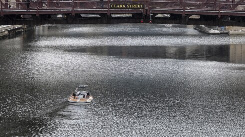 A group of women cruise along the Chicago River in a hot tube boat, in The Loop, Wednesday, Feb. 4, 2026.