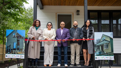 Cook County Land Bank Authority Executive Director Jessica Caffrey (left), Chicago Department of Housing Commissioner Lissette Castañeda, Greenwood Archer Capital Executive Director Terrence Johnson, developer Luis and Marsha Castro during a ribbon cutting ceremony.