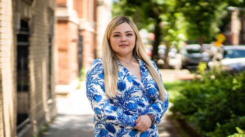 Olga Tsoi, 31, outside her Rogers Park apartment on the North Side.