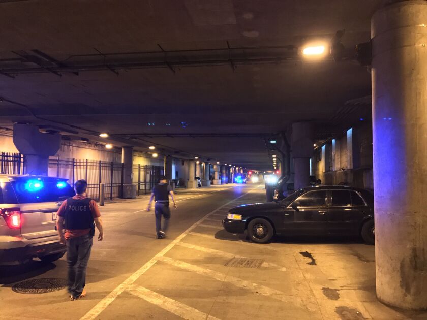 Police investigate after a man was shot on Monday afternoon along Lower Wacker Drive near Garland Court underneath the Loop. | Mitch Armentrout/Sun-Times