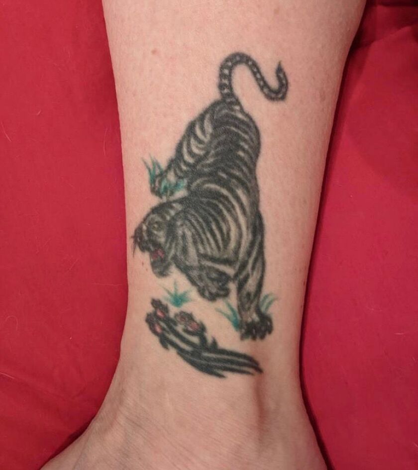 Aileen Blanchard, 55, got her tiger tattoo in 1992 — 30 years before her daughter got almost identical tigers on her torso.