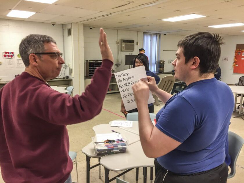 Danny Bruno, 32, seen here in blue t-shirt with his father Rick, is one of 44 developmentally disabled individuals affected by Easterseals’ decision to close its two adult day programs in Chicago and Tinley Park. Danny has autism. | Mark Brown/Sun-Times