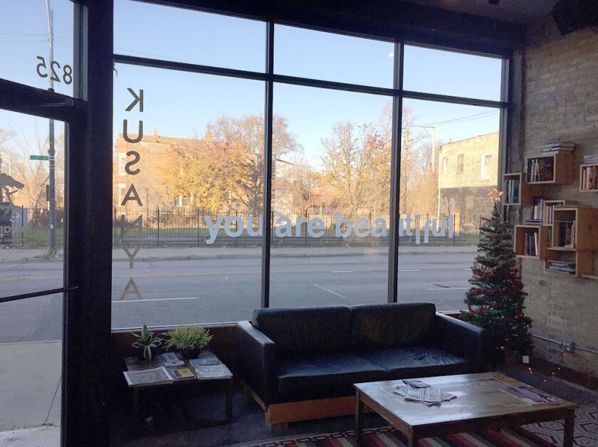 Kusanya Cafe looks out across 69th Street at local artist Matthew Hoffman’s “You Are Beautiful” installation. | Neil Steinberg/Sun-Times