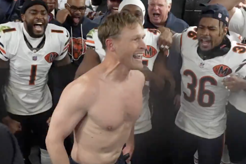 A shirtless Bears coach Ben Johnson celebrates with his team after beating the Philadelphia Eagles on Friday Nov. 28, 2025, in Philadelphia.