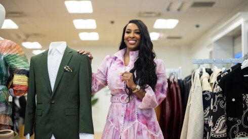 Owner Kharyn Beard stands in Kham'ryn B Shoes & Accessories in the Roosevelt Collection shopping center.