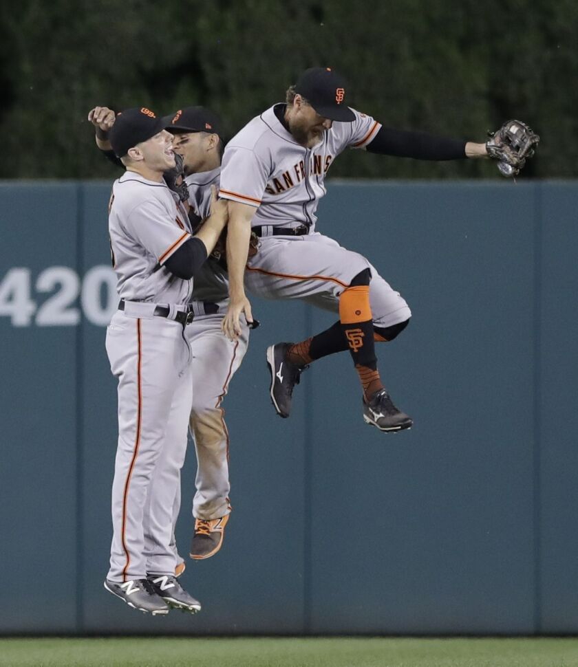 David Ross said Hunter Pence does a good job keeping his teammates focused on the game at<br>hand. | Carlos Osorio/Associated Press