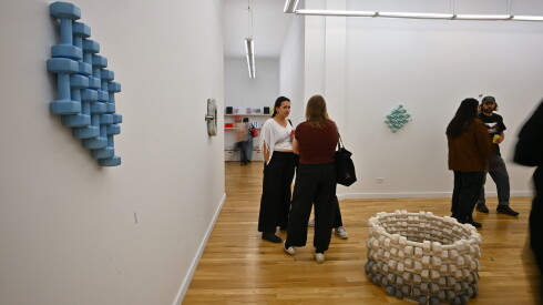 Visitors view sculptures and installations by Olivia Zubko at Western Exhibitions during Chicago Exhibition Week.