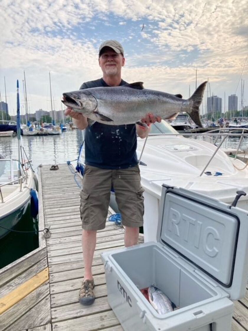Steve Plaxco wth a big Chinook out of Montrose Harbor. Provided photo