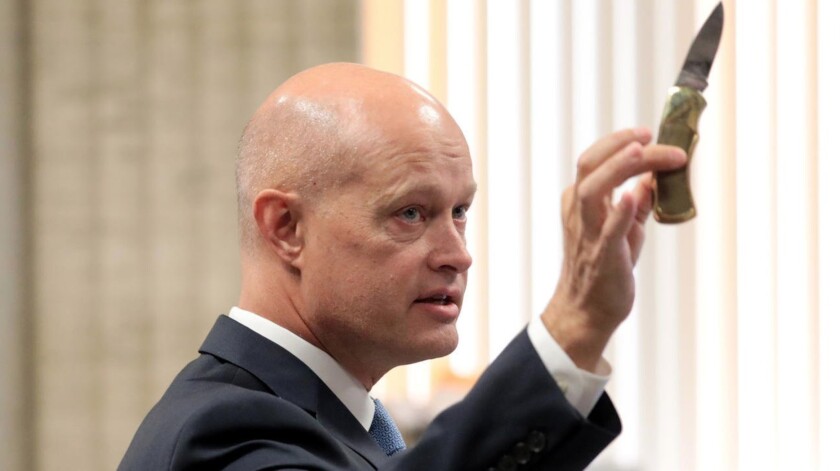 Special Prosecutor Joseph McMahon shows the jury during his opening statement the knife Laquan McDonald held before he was shot. | Antonio Perez/Chicago Tribune pool photo