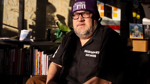 Co-owner Jerry Morrison sits in Bridgeport Records on the South Side, Sunday, Dec. 21, 2025. He and his co-owner received a death threat Saturday for selling Black and Latino music.