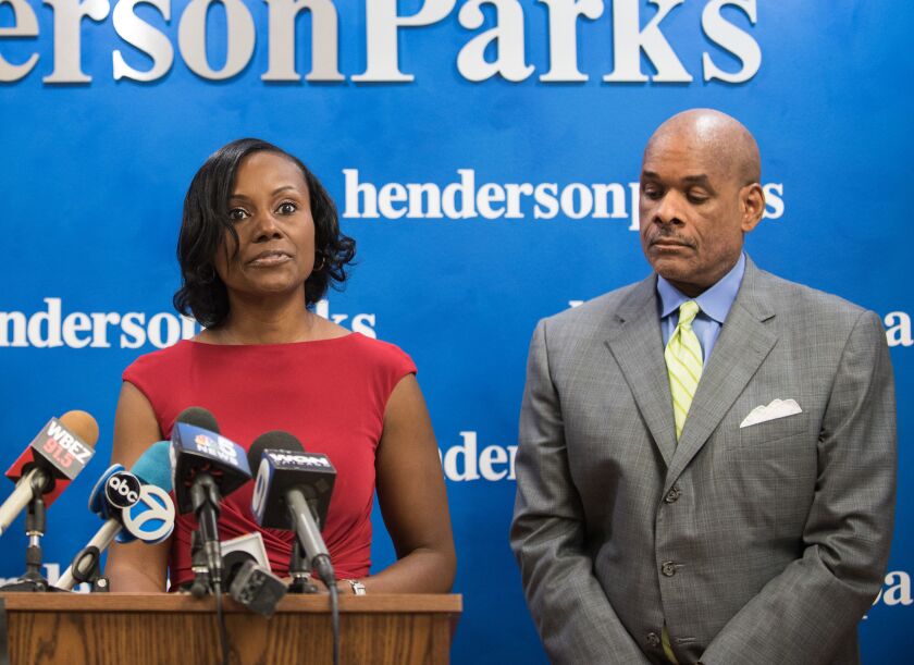 Attorney Rhonda Crawford, seen here with her attorney Victor Henderson, wanted to postpone her indictment until after the election. / Sun-Times file photo