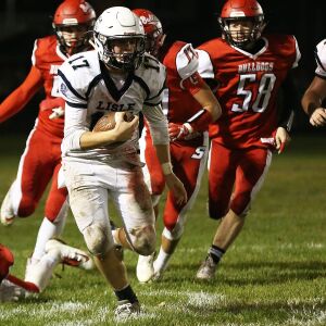 Lisle’s Jay McGrath carries the ball. | Allen Cunningham / for Chicago Sun-Times