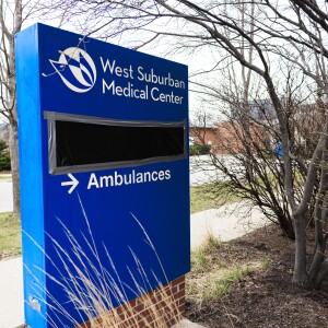 Black plastic covers the emergency room signs at West Suburban Medical Center in Oak Park on Wednesday.