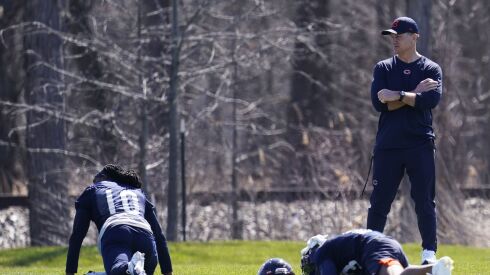 Bears head coach Matt Eberflus watches players during voluntary minicamp at Halas Hall last month.