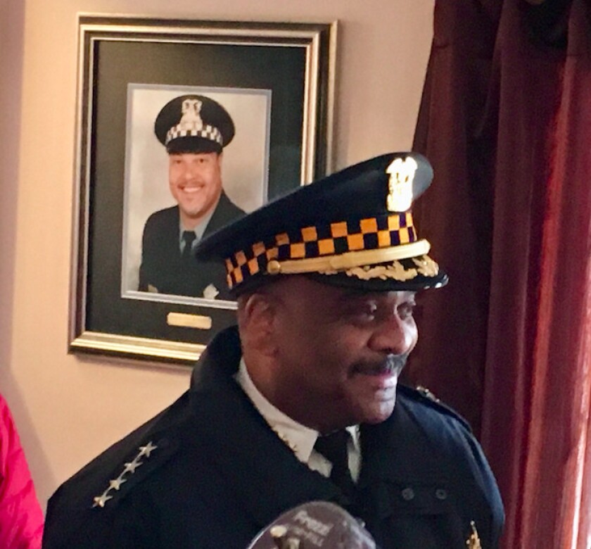 Supt. Eddie Johnson in front of a picture of the late Chicago Police Ofc. Paul Nauden. | Mitch Dudek/Sun-Times