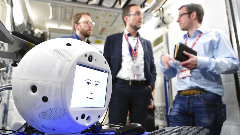 The round, artificial intelligence robot Cimon is part of SpaceX’s latest delivery to the International Space Station. | T. Bourry/ESA/DLR via AP